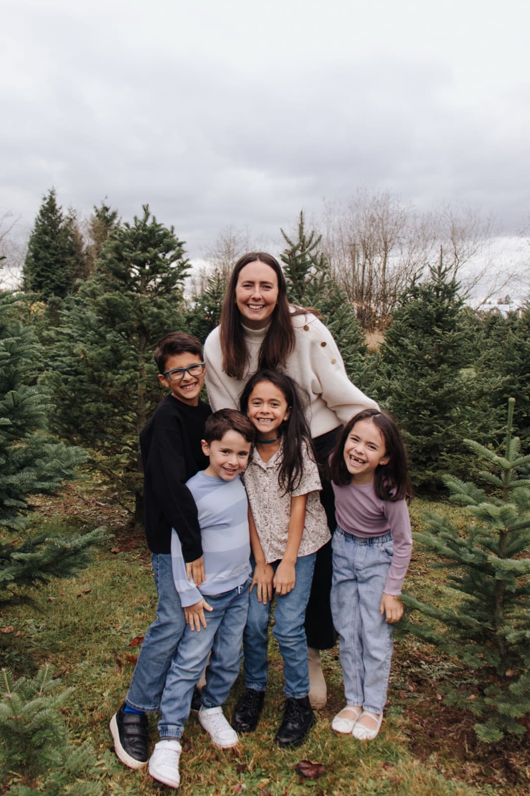 Lauren with her four kids at the Christmas tree farm